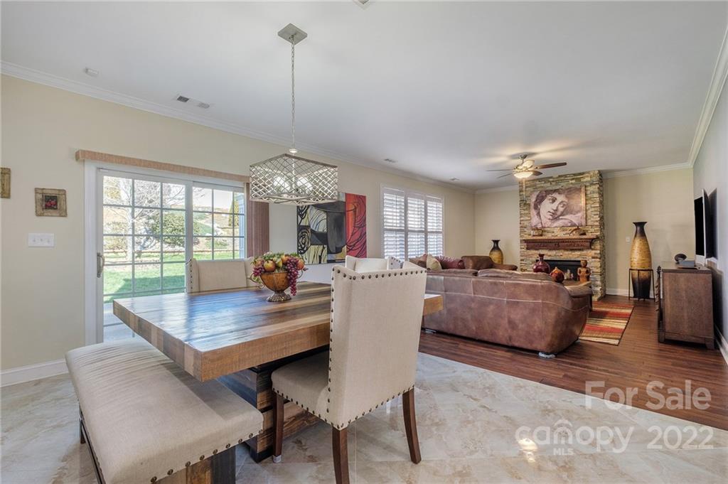 14410 Winged Teal Road Charlotte, NC 28278 - Photo 14 of 38 a dining room with furniture and window