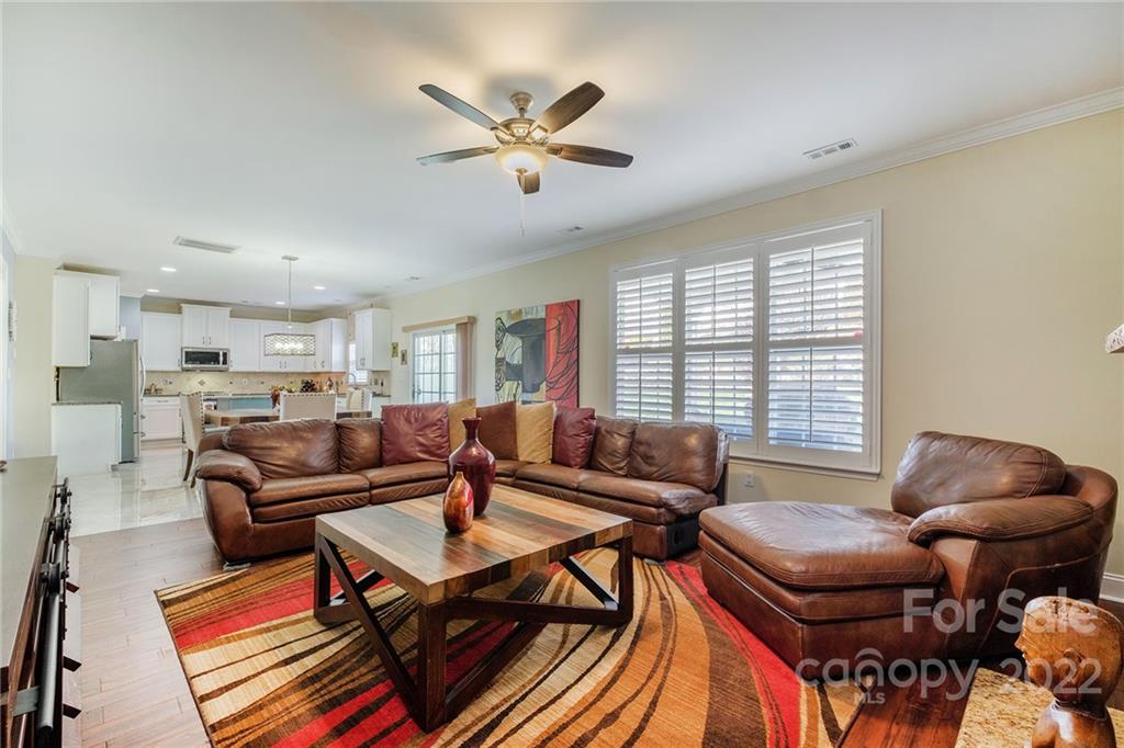 14410 Winged Teal Road Charlotte, NC 28278 - Photo 16 of 38 a living room with furniture and a window