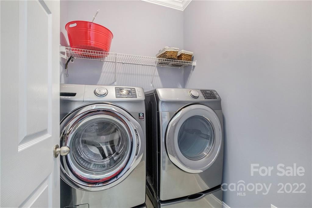 14410 Winged Teal Road Charlotte, NC 28278 - Photo 19 of 38 a utility room with dryer and washer