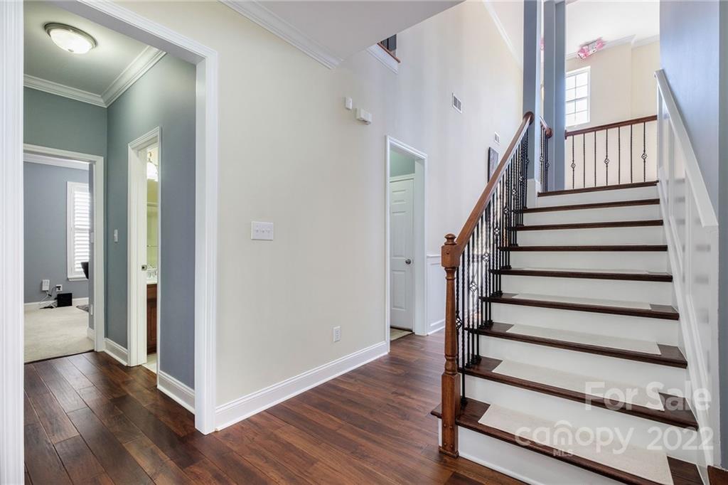 14410 Winged Teal Road Charlotte, NC 28278 - Photo 20 of 38 a view of entryway with wooden floor and stairs