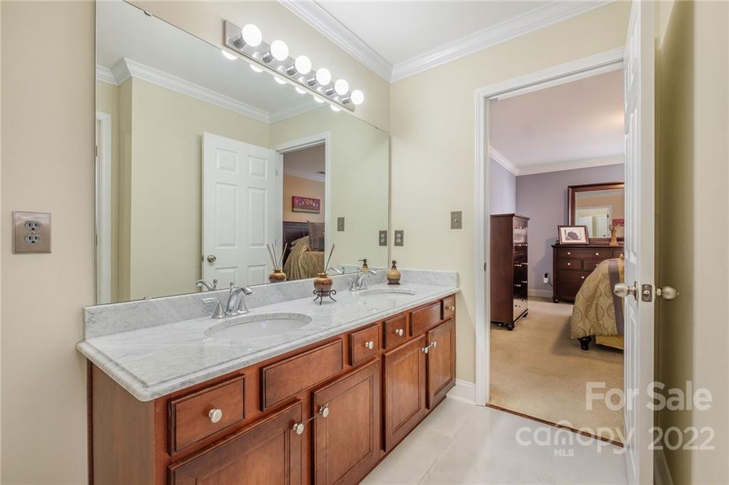 14410 Winged Teal Road Charlotte, NC 28278 - Photo 27 of 38 a bathroom with a sink double vanity