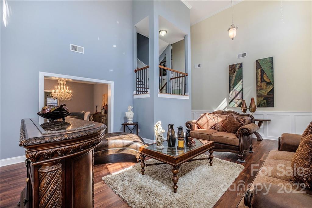 14410 Winged Teal Road Charlotte, NC 28278 - Photo 5 of 38 a living room with furniture and a piano