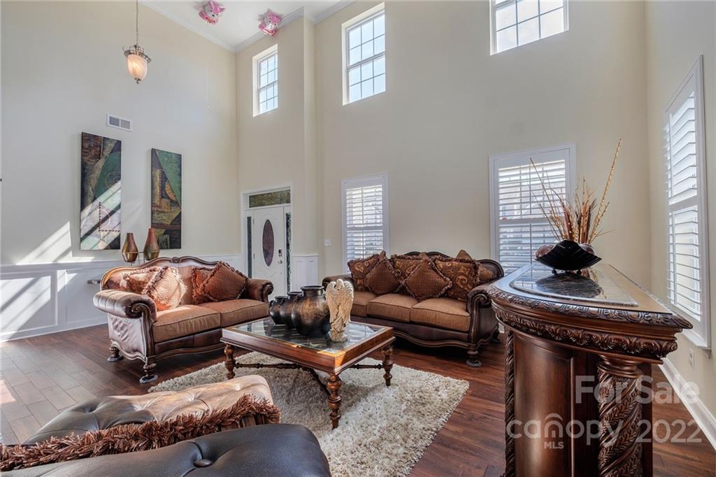 14410 Winged Teal Road Charlotte, NC 28278 - Photo 6 of 38 a living room with furniture and a window