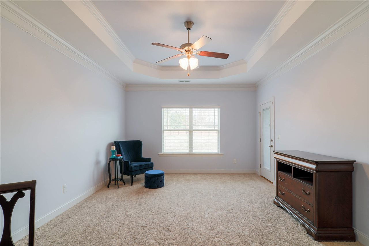 113 Weathers Street Rolesville, NC 27571 - Photo 13 of 25 Master BR has access to enclosed porch!