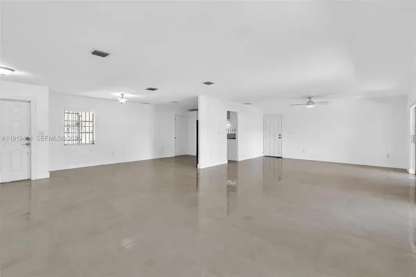 a view of a livingroom with a staircase