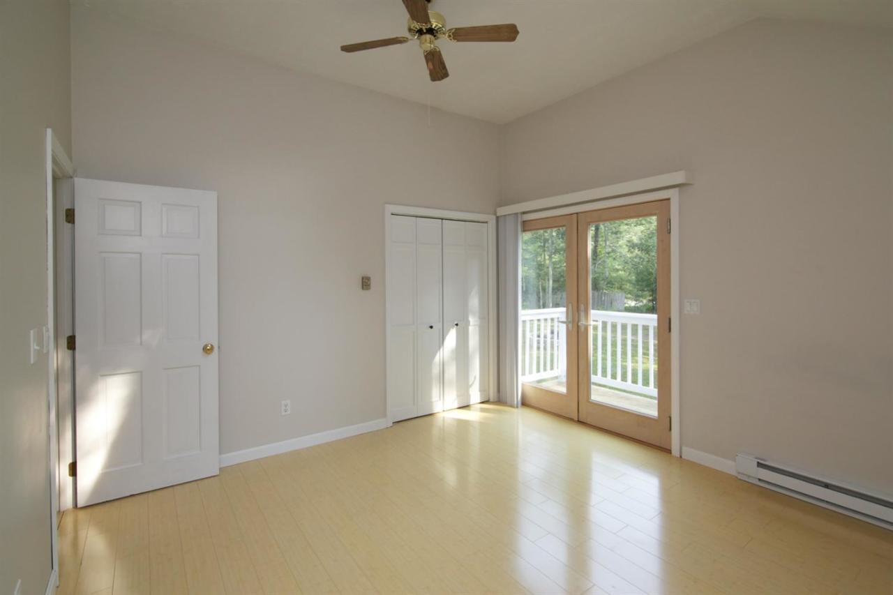12 Santuit Pond Road Mashpee, MA 02649 - Photo 19 of 31 a view of an empty room with a window