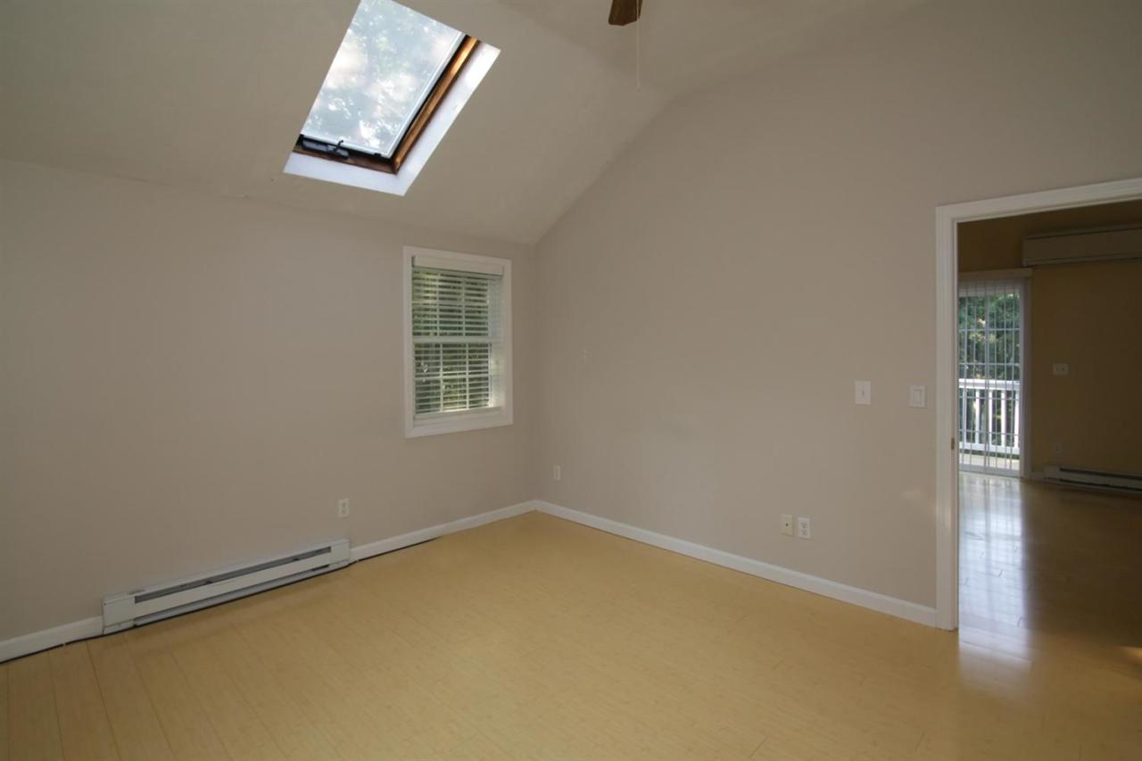 12 Santuit Pond Road Mashpee, MA 02649 - Photo 20 of 31 an empty room with a window