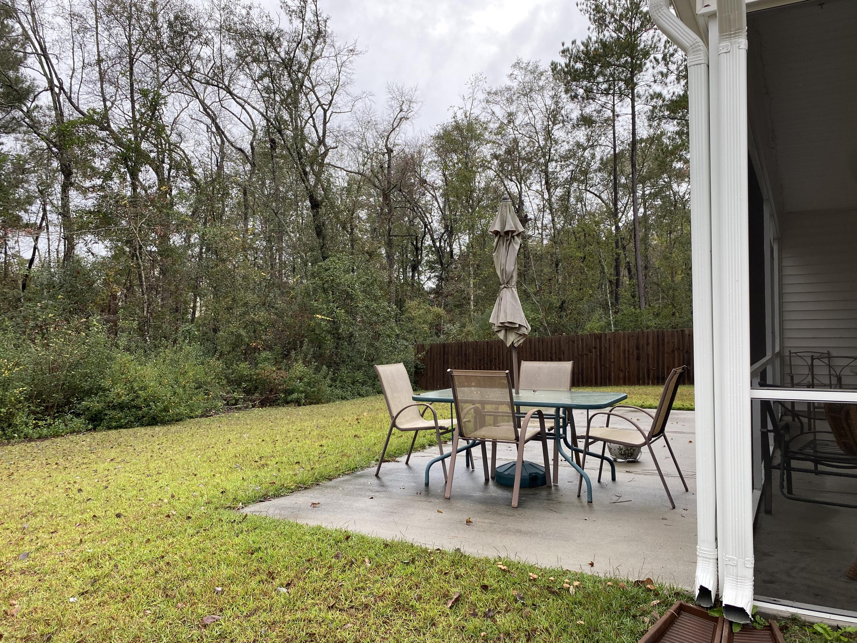 416 Rivers Row Drive Moncks Corner, SC 29461 - Photo 5 of 7 Back Patio/Screen Porch