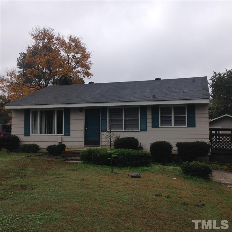 3918 Memory Lane Raleigh, NC 27604 - Photo 1 of 14 a front view of a house with a yard