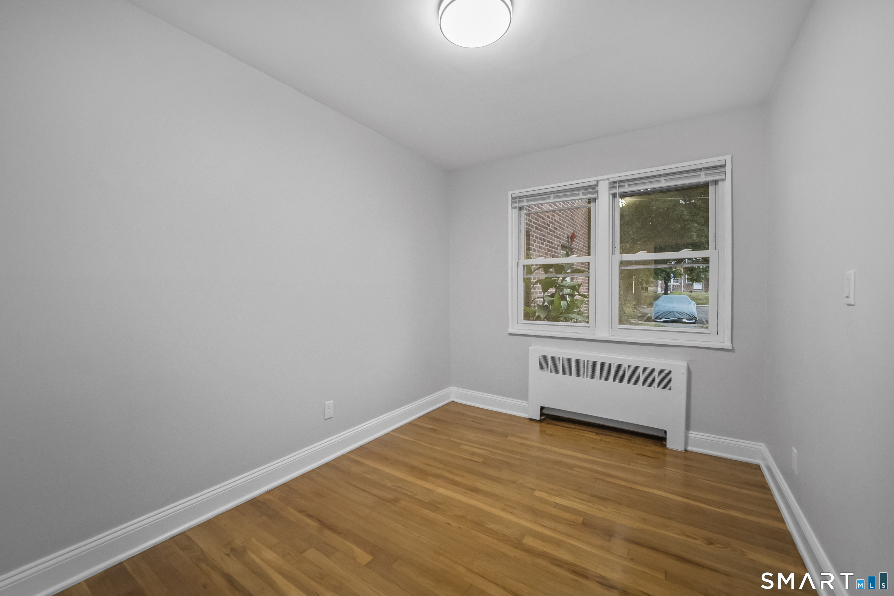 66 Blachley Road, Unit D Stamford, CT 06902 - Photo 9 of 34 Photos are of another unit that is a mirror image of this layout. Finishes may vary.