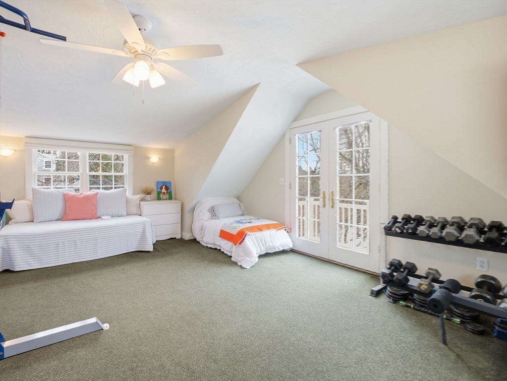 49 Salem Street Andover, MA 01810 - Photo 33 of 39 a bedroom with furniture and a chandelier