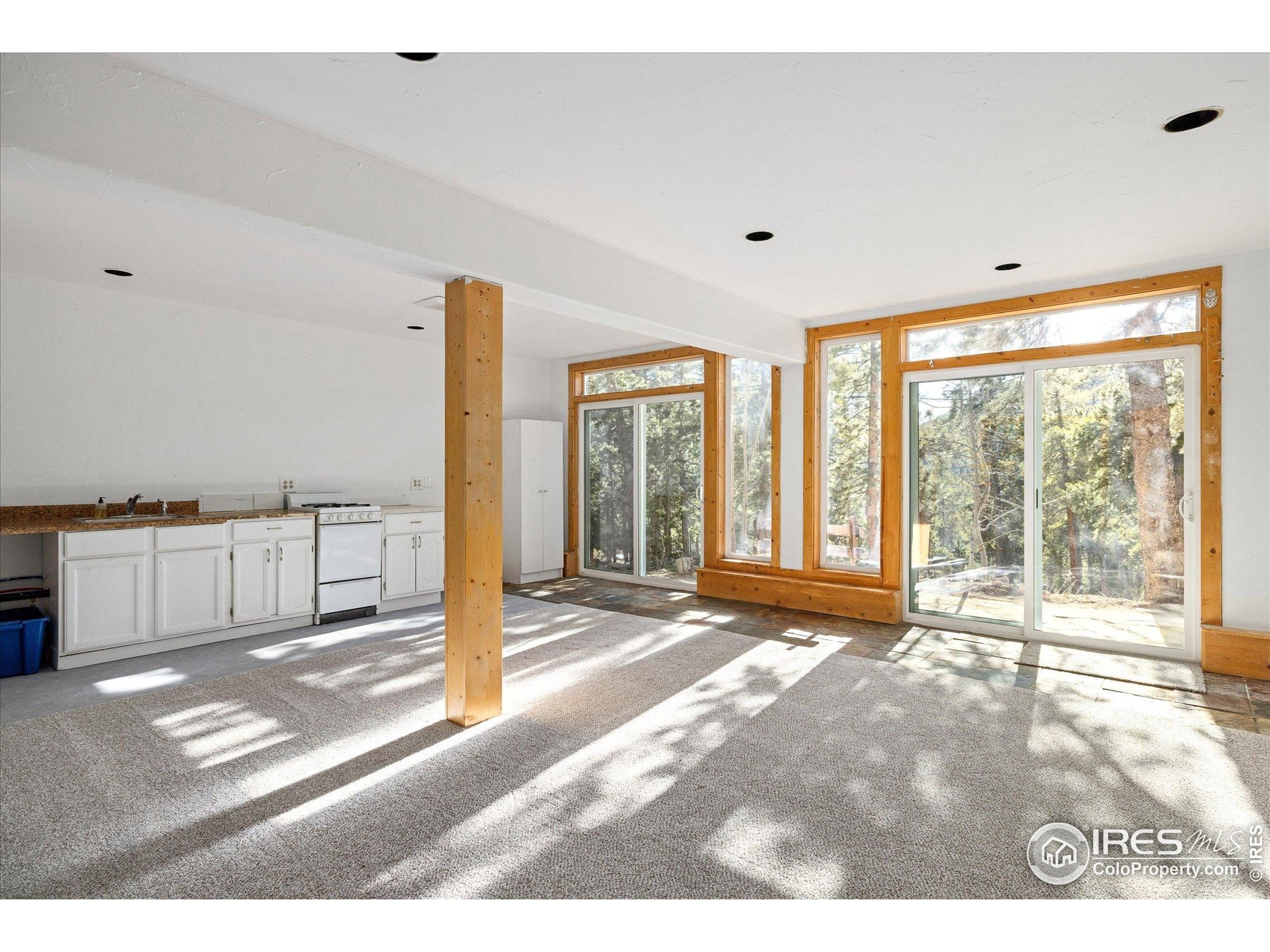 246 Rudi Lane West Golden, CO 80403 - Photo 36 of 48 a view of a room with floor to ceiling windows