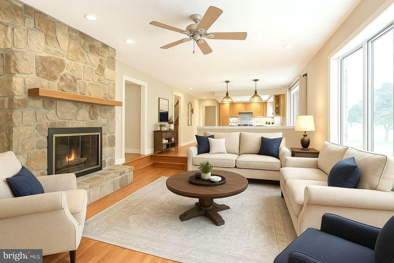 1056 Chews Landing Road Clementon, NJ 08021 - Photo 17 of 55 a living room with furniture a fireplace and a large window