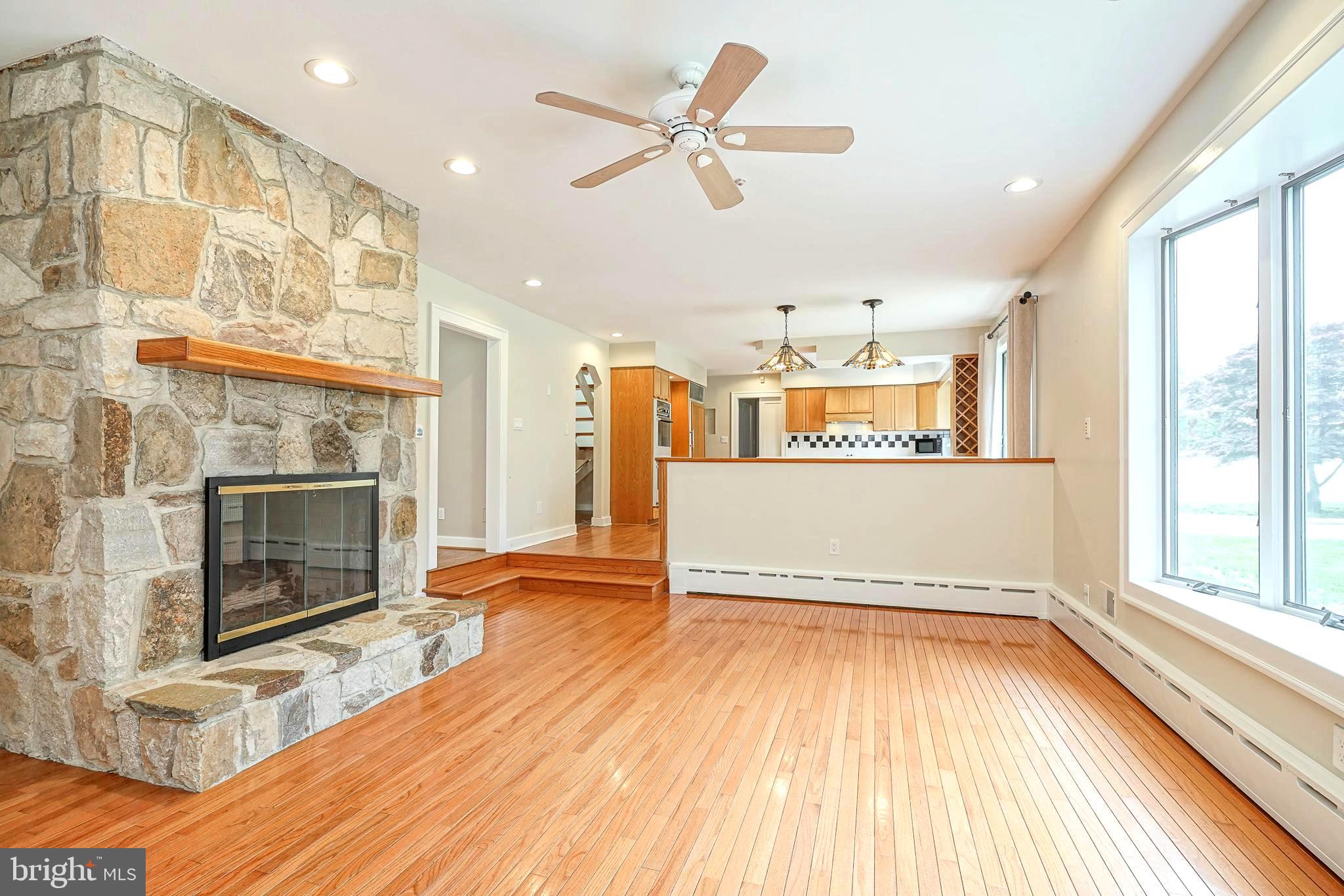 1056 Chews Landing Road Clementon, NJ 08021 - Photo 19 of 55 a view of a living room with stainless steel appliances wooden floor and a large window