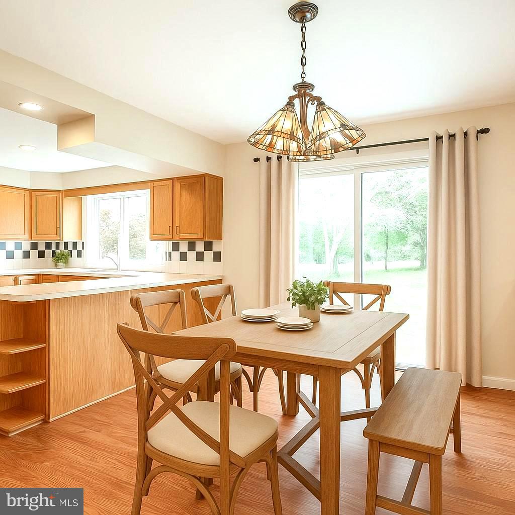 1056 Chews Landing Road Clementon, NJ 08021 - Photo 22 of 55 a view of a dining room with furniture window and outside view