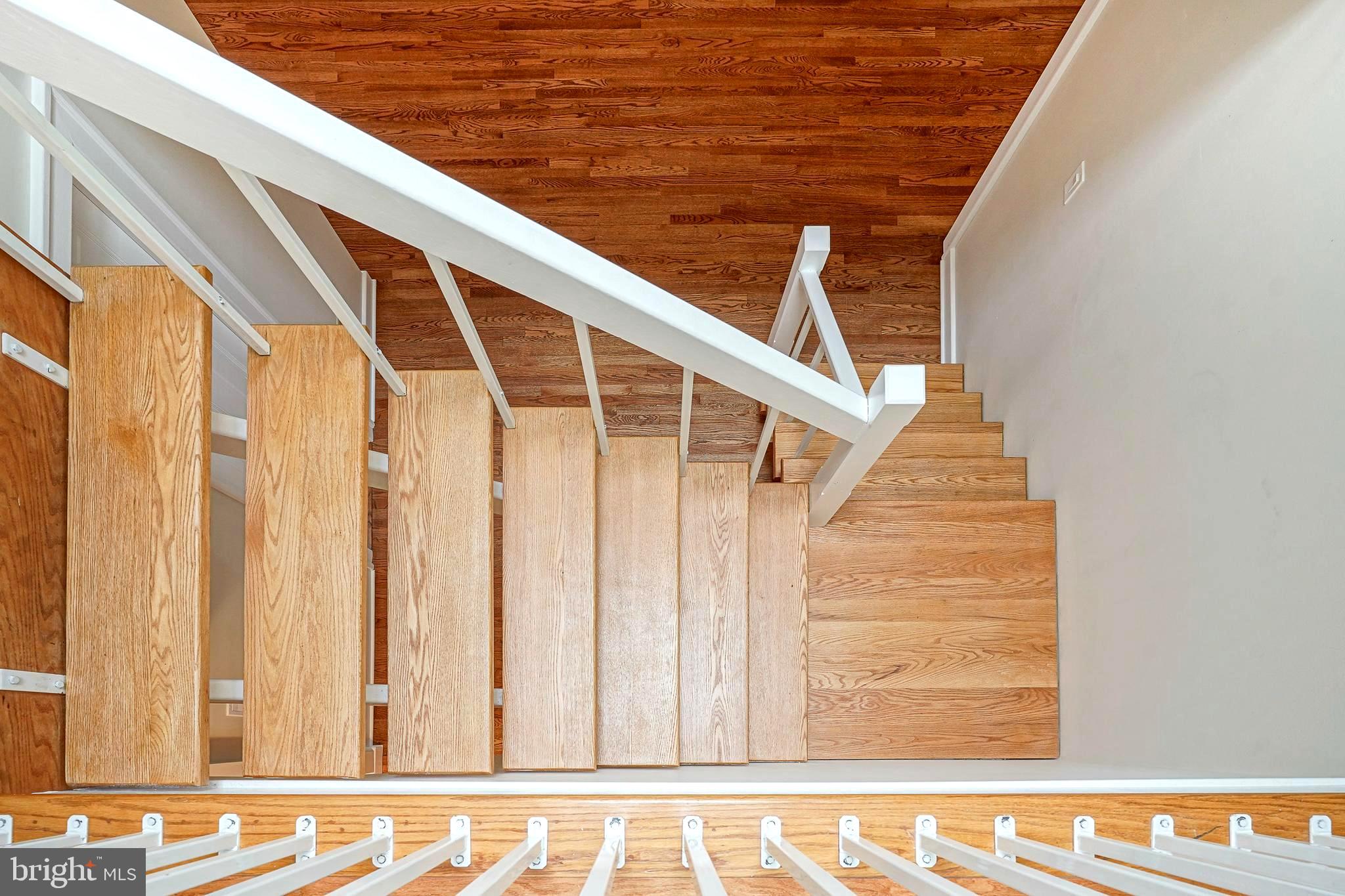 1056 Chews Landing Road Clementon, NJ 08021 - Photo 28 of 55 a view of wooden floor and staircase