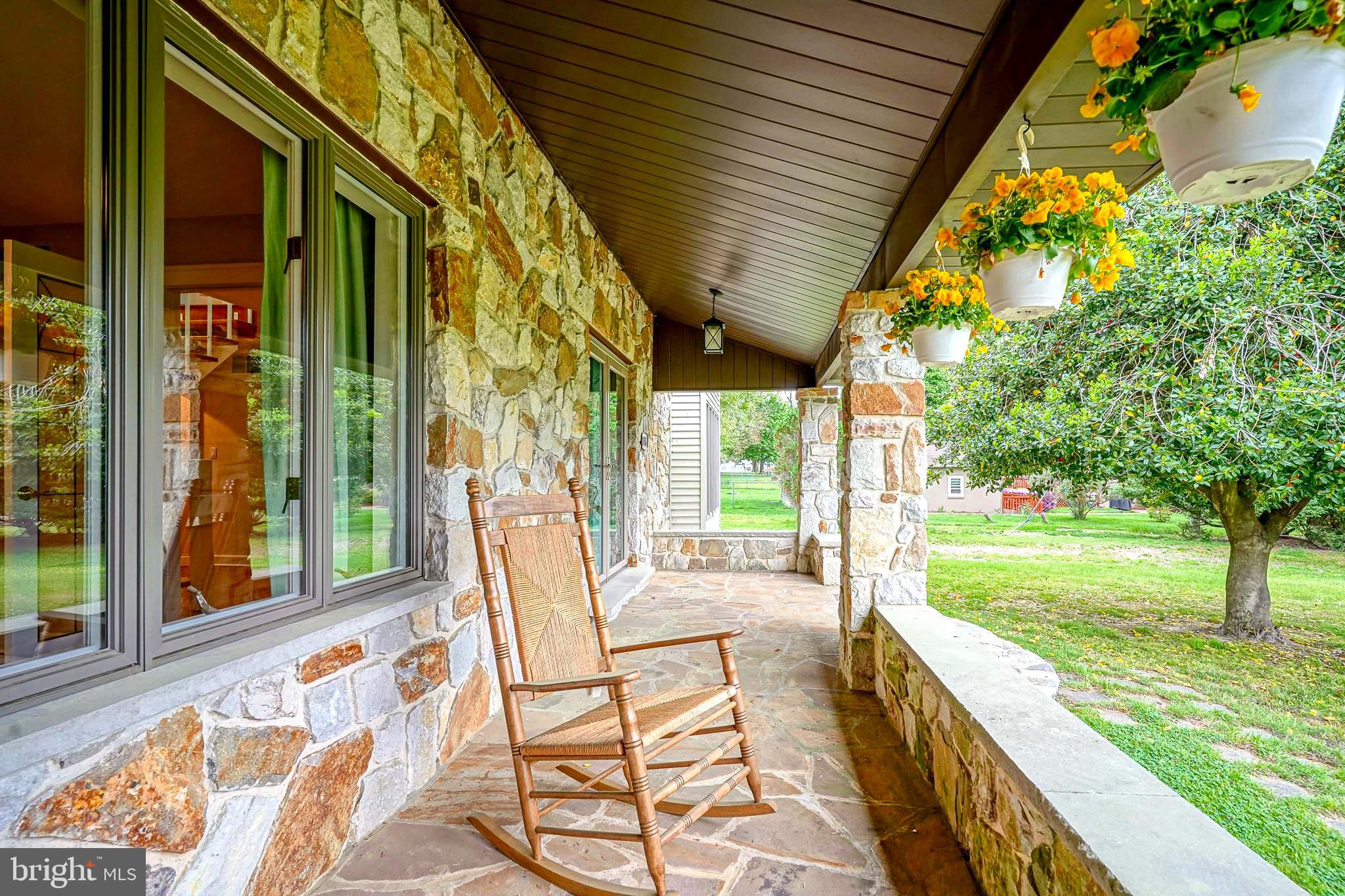 1056 Chews Landing Road Clementon, NJ 08021 - Photo 4 of 55 a view of a porch with furniture and garden