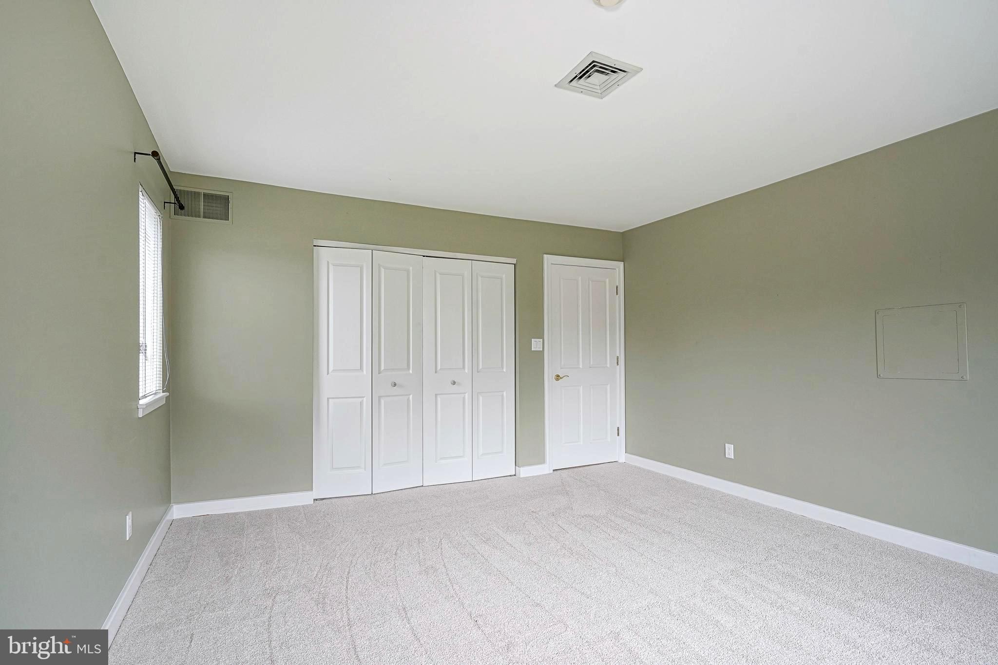 1056 Chews Landing Road Clementon, NJ 08021 - Photo 47 of 55 a view of an empty room and a window