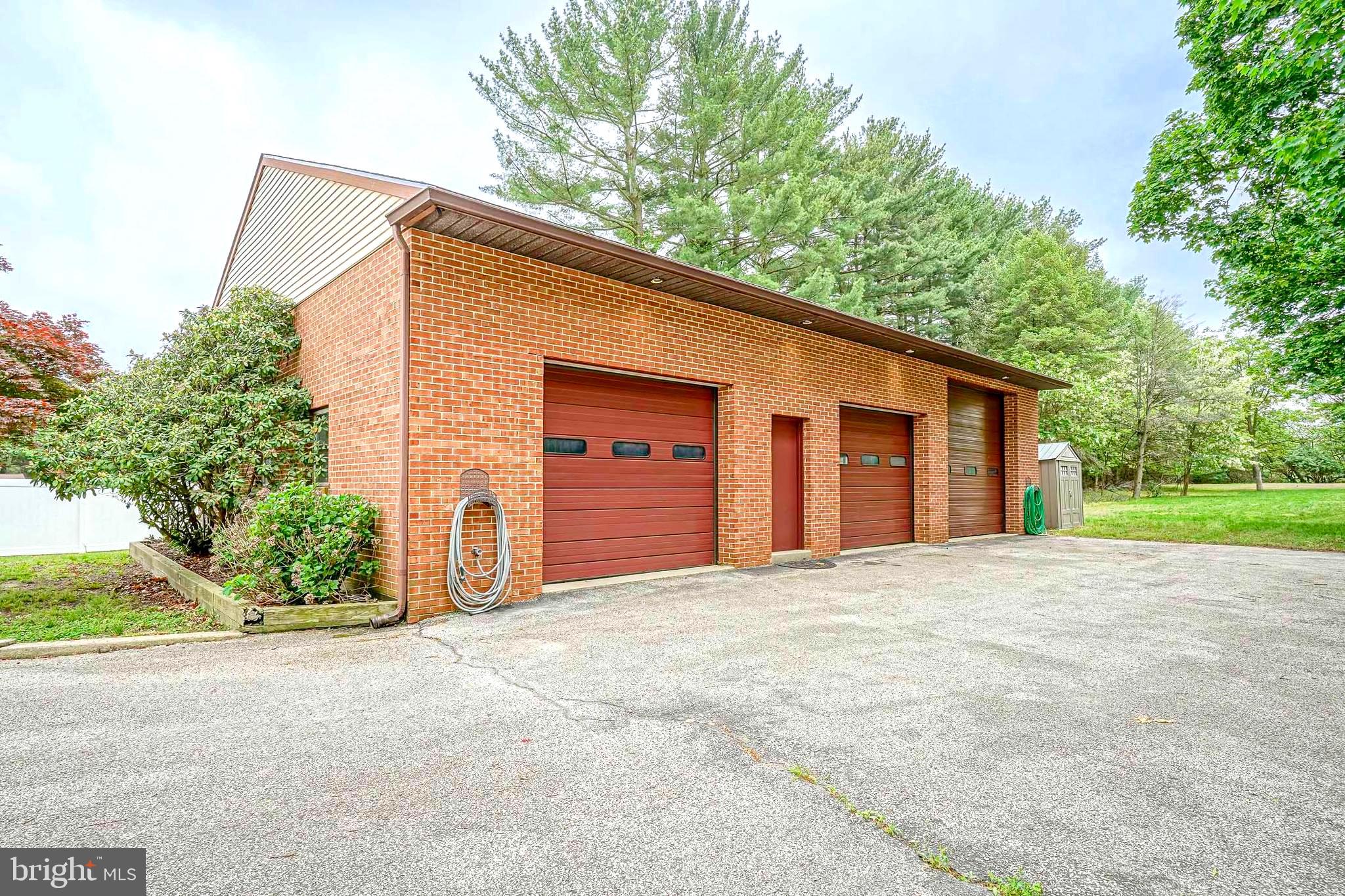 1056 Chews Landing Road Clementon, NJ 08021 - Photo 50 of 55 a front view of a house with a garage