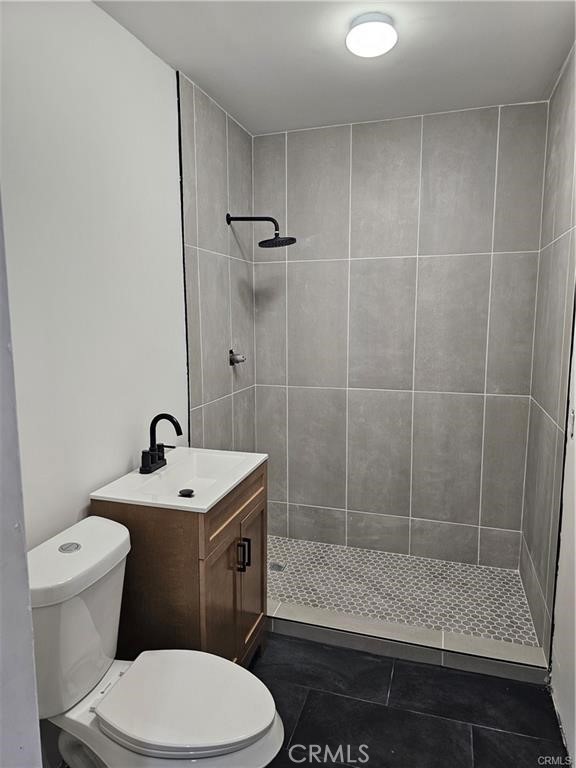 6502 Dos Rios Road Downey, CA 90240 - Photo 20 of 20 a bathroom with a sink a toilet and shower