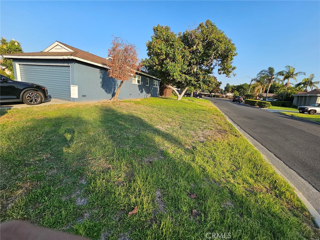 6502 Dos Rios Road Downey, CA 90240 - Photo 7 of 20 a view of a house with a yard