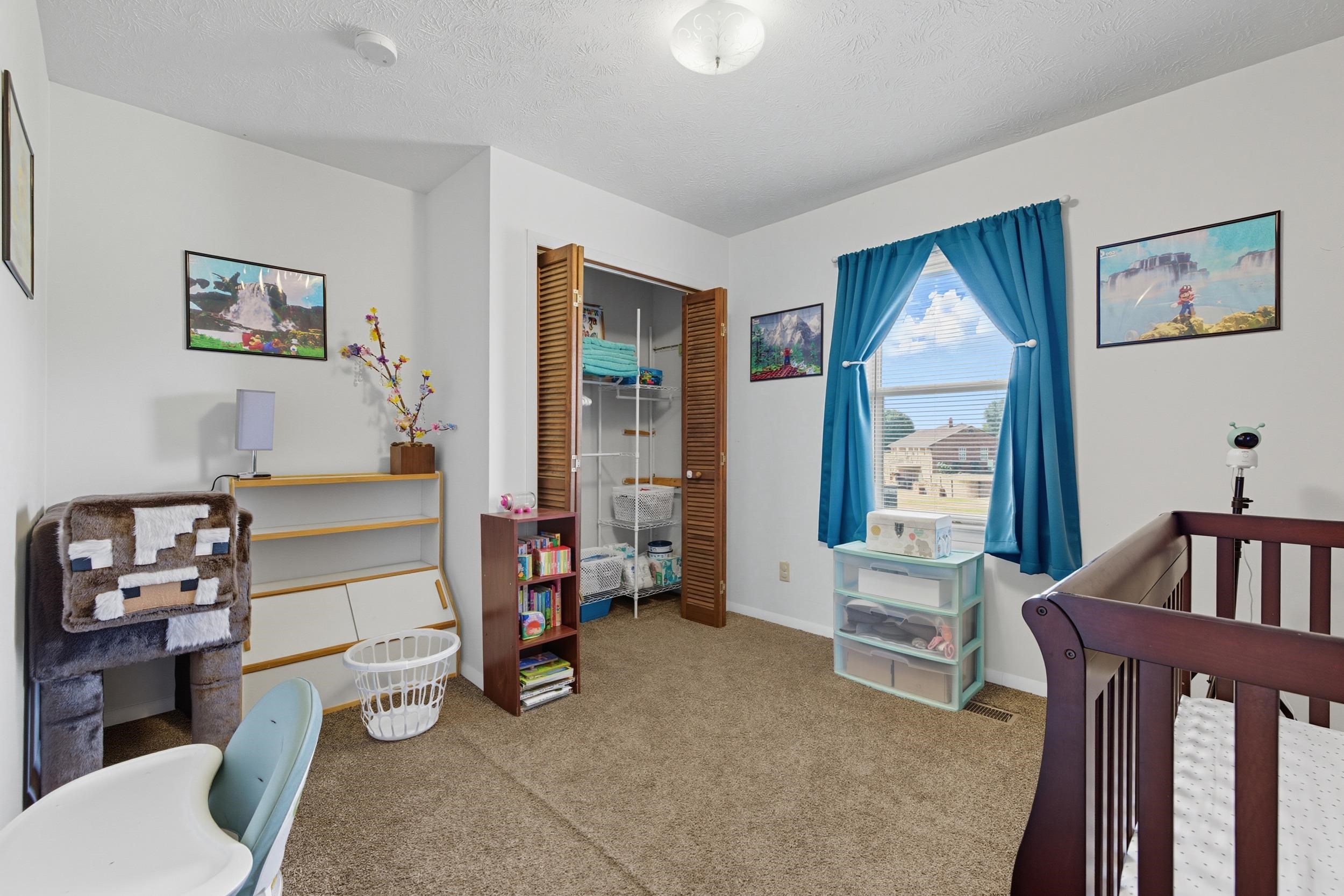 9108 Nazarene Church Road Bridgewater, VA 22812 - Photo 23 of 72 a room with furniture and two large window