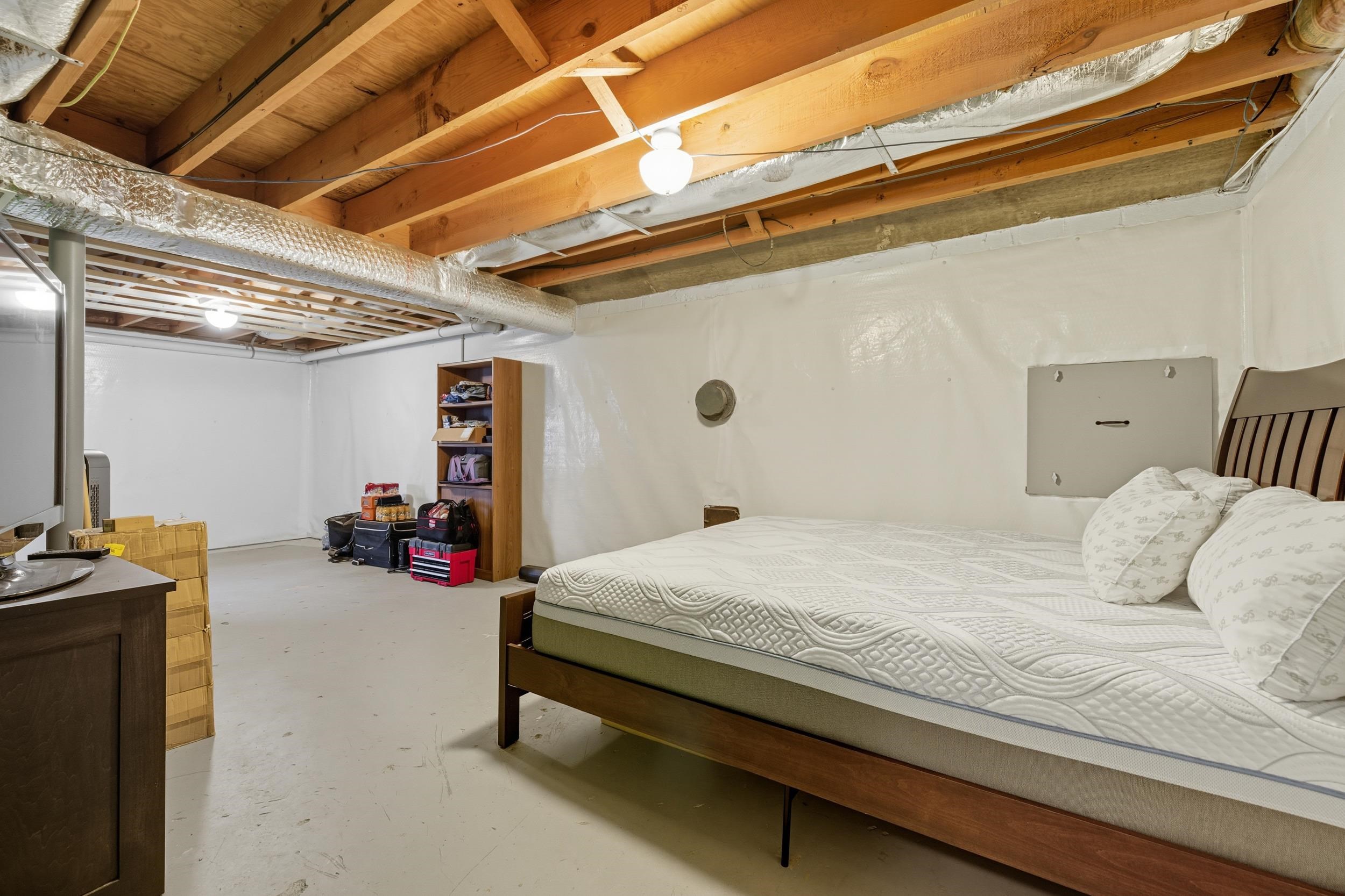 9108 Nazarene Church Road Bridgewater, VA 22812 - Photo 27 of 72 a bedroom with bed and car