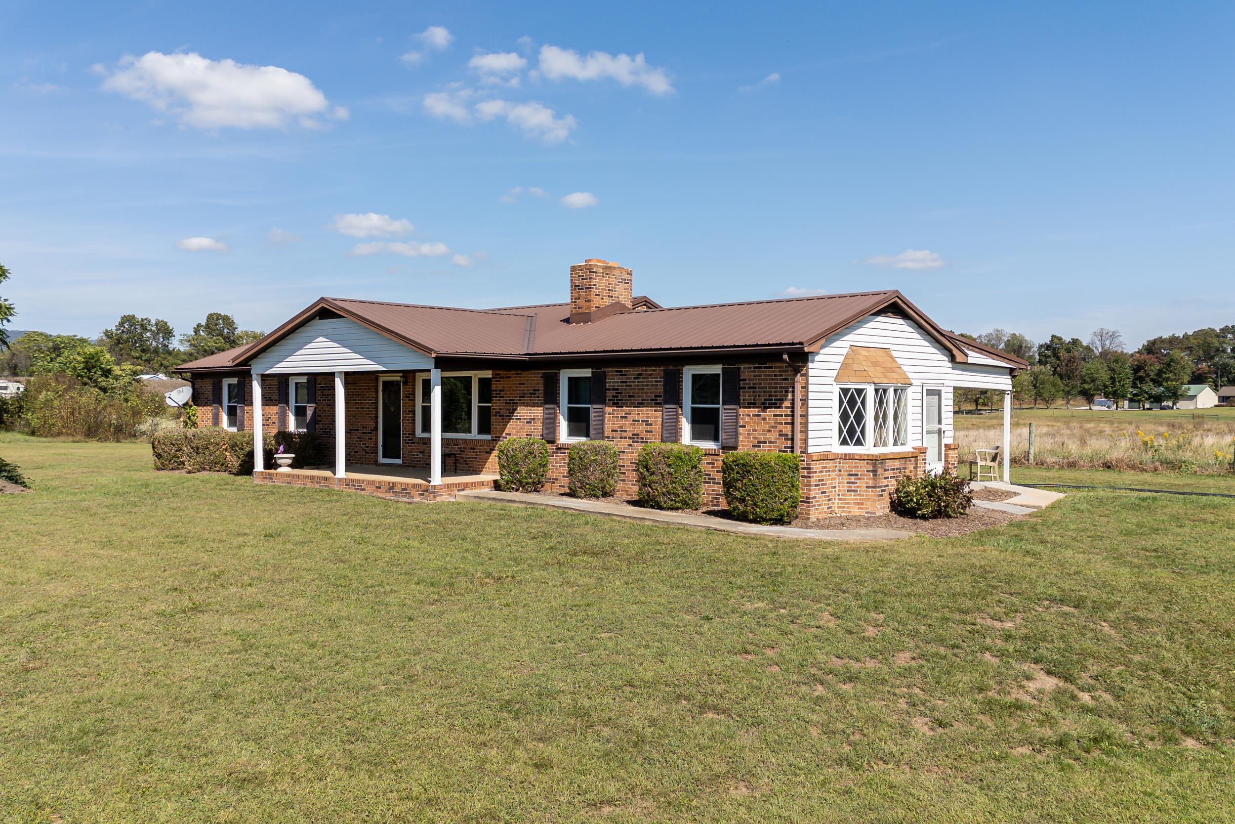 9108 Nazarene Church Road Bridgewater, VA 22812 - Photo 29 of 72 a front view of a house with a yard