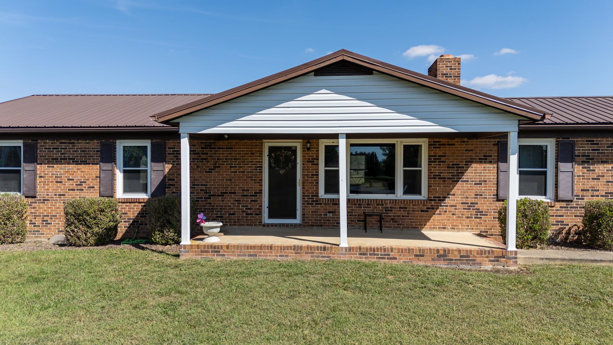 9108 Nazarene Church Road Bridgewater, VA 22812 - Photo 31 of 72 a front view of a house with a garden