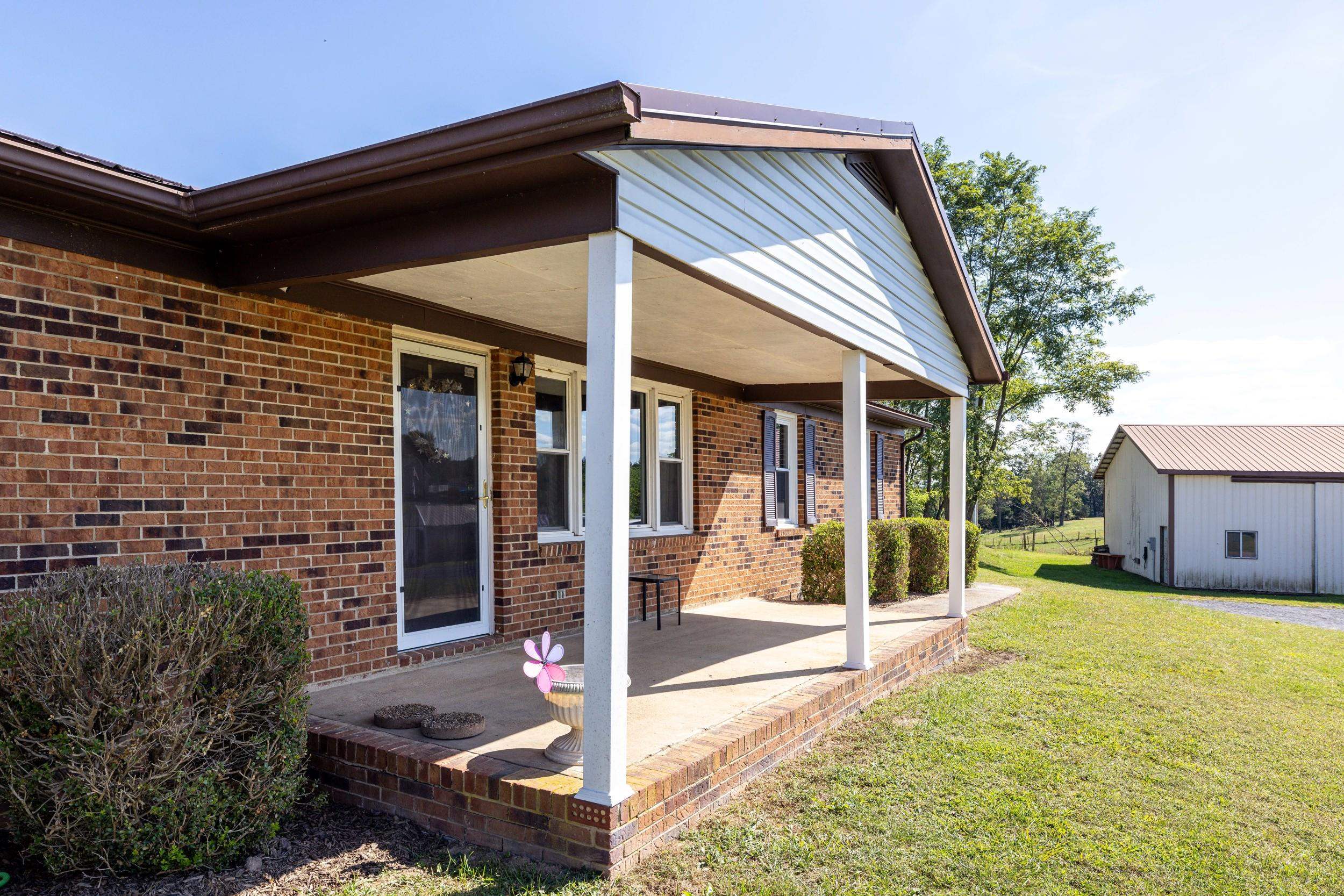 9108 Nazarene Church Road Bridgewater, VA 22812 - Photo 32 of 72 a view of a house with backyard and porch