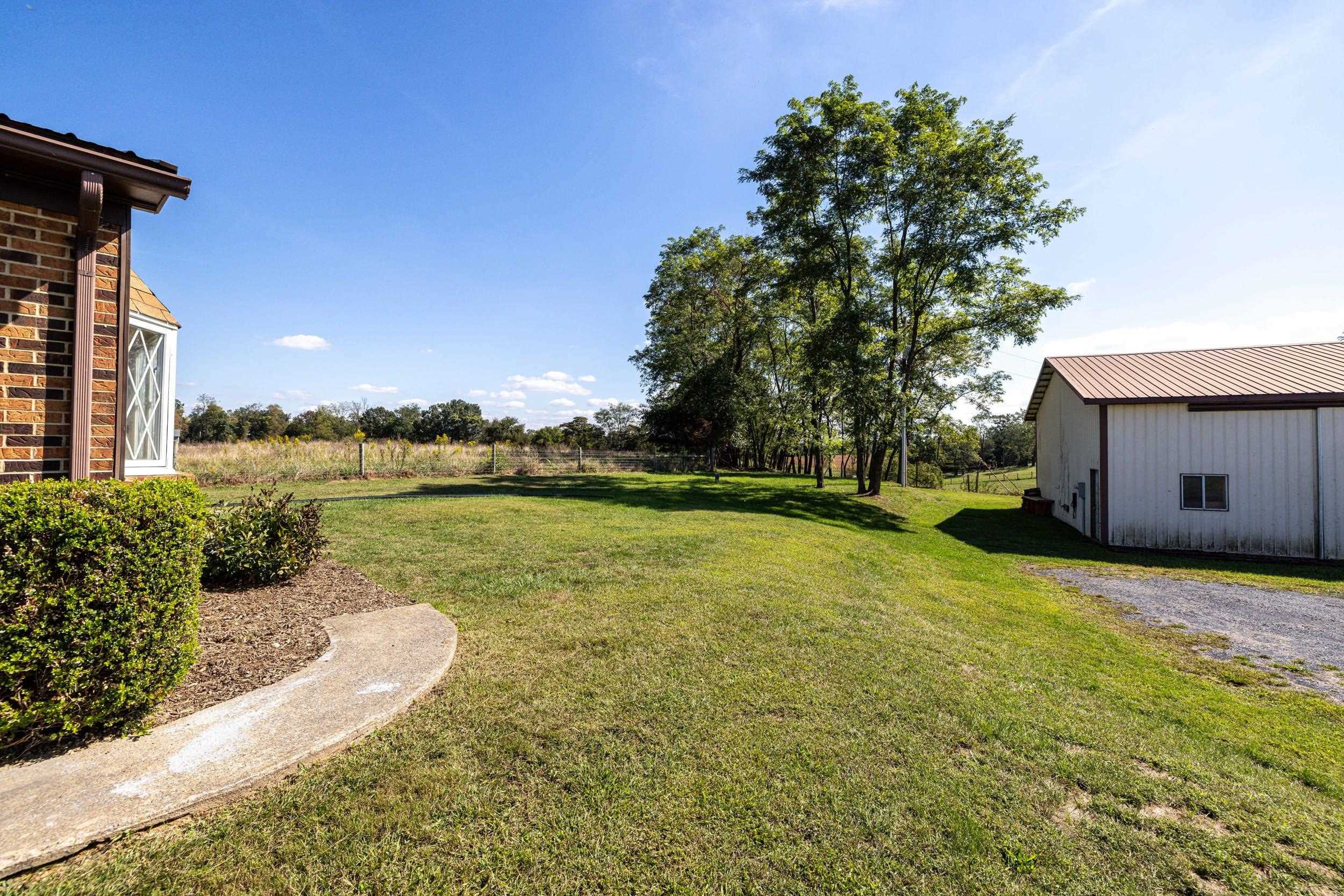 9108 Nazarene Church Road Bridgewater, VA 22812 - Photo 39 of 72 a view of a lake with a house in the background