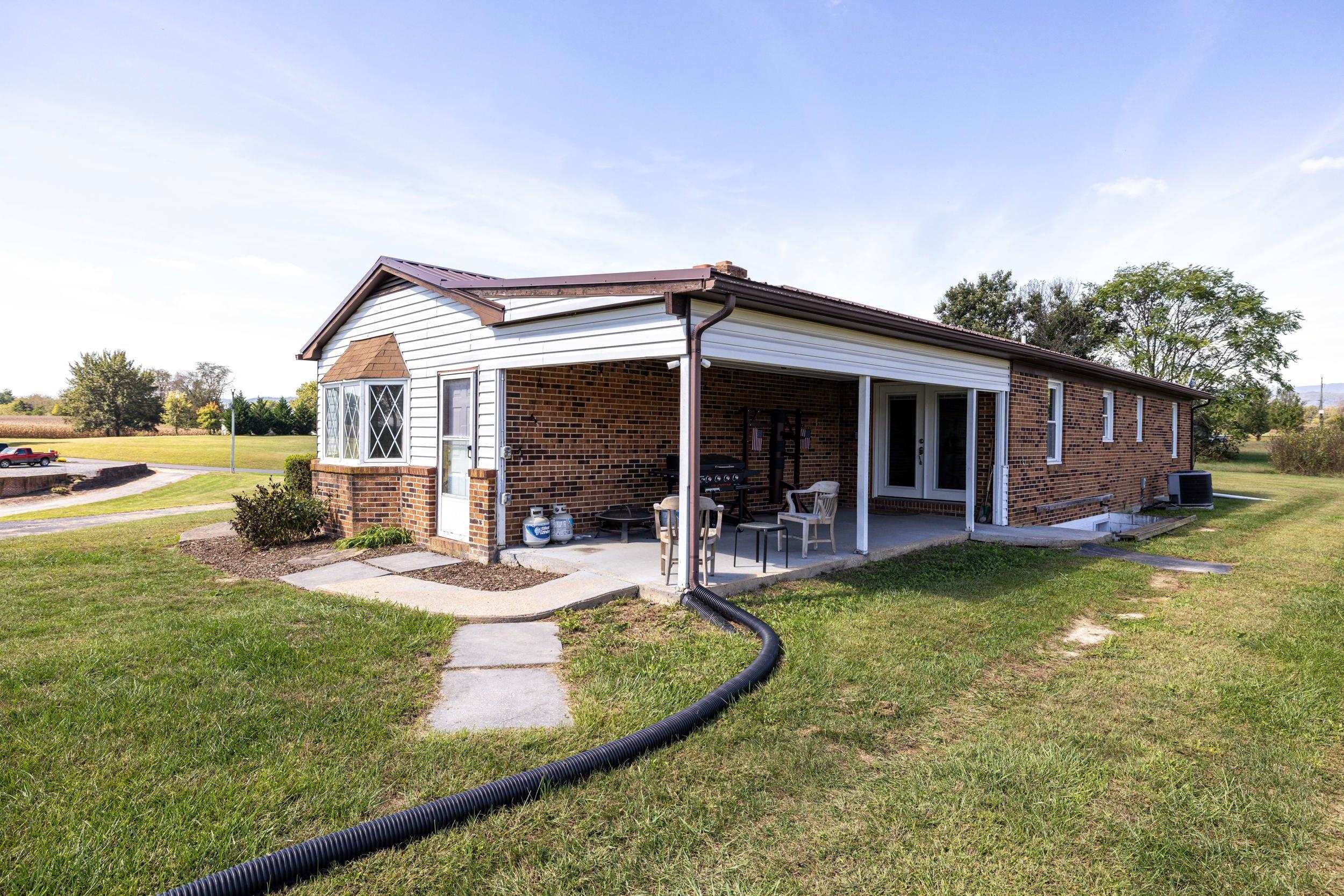 9108 Nazarene Church Road Bridgewater, VA 22812 - Photo 41 of 72 a view of a house with backyard porch and patio