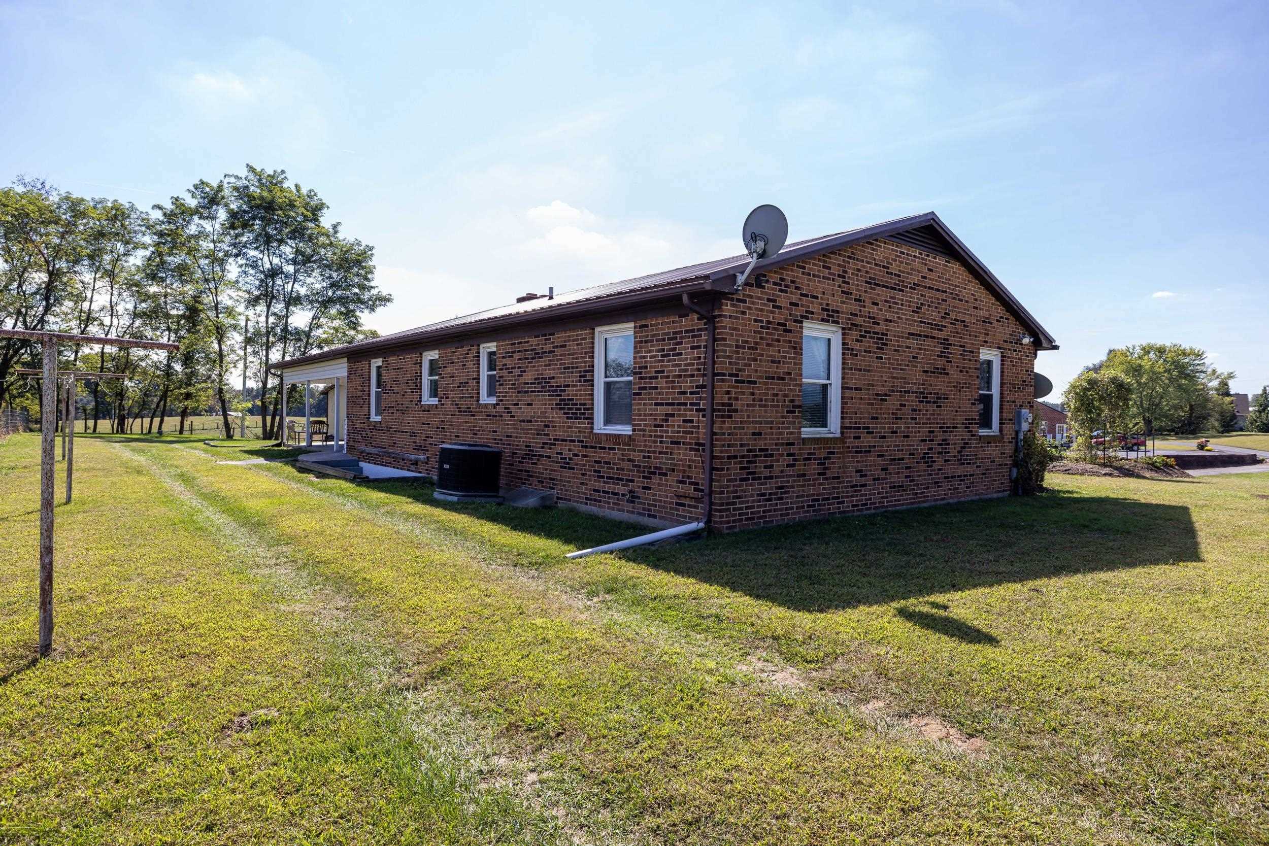 9108 Nazarene Church Road Bridgewater, VA 22812 - Photo 44 of 72 a view of a house with a yard