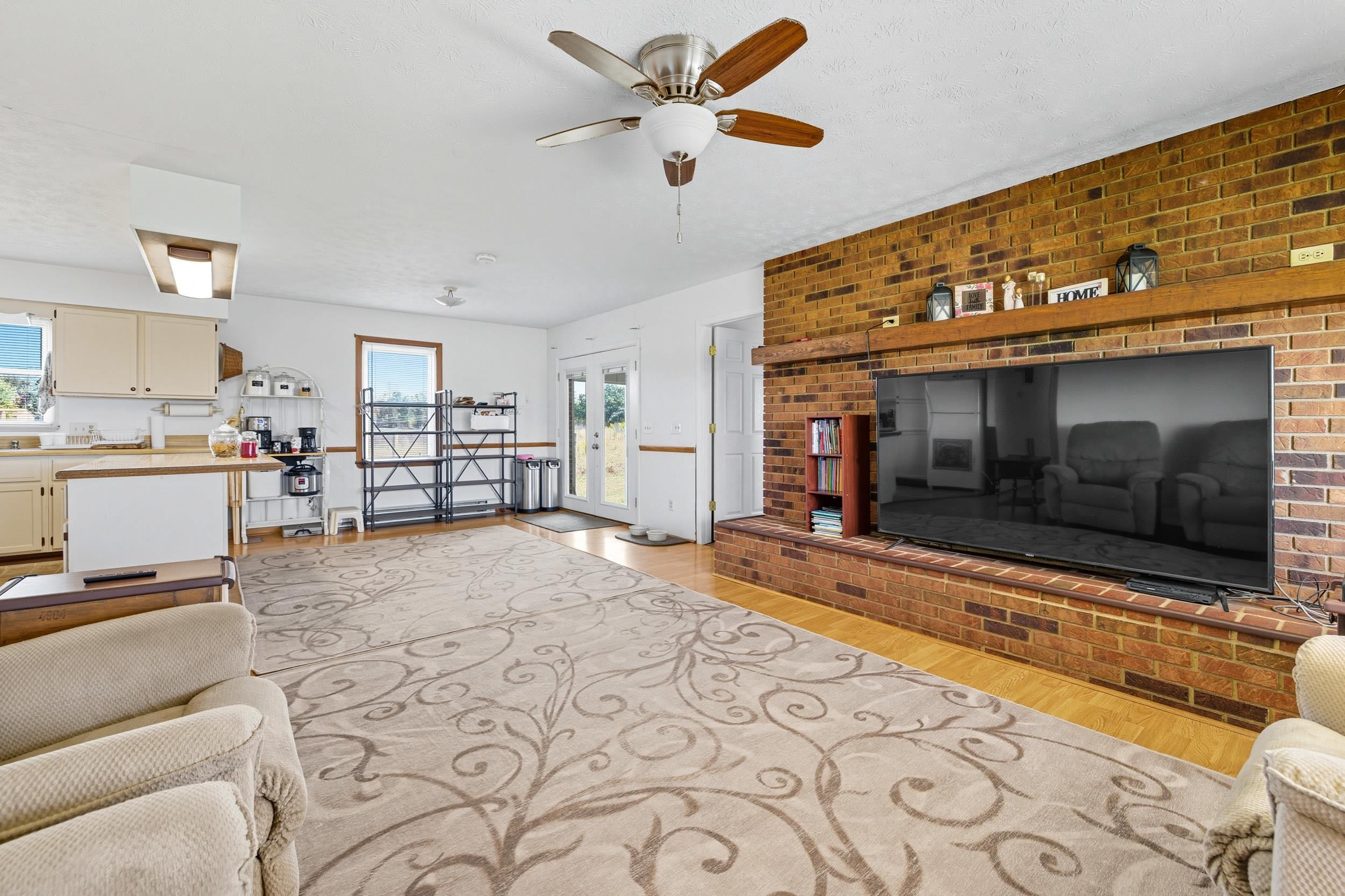 9108 Nazarene Church Road Bridgewater, VA 22812 - Photo 9 of 72 a living room with a couch and a flat screen tv