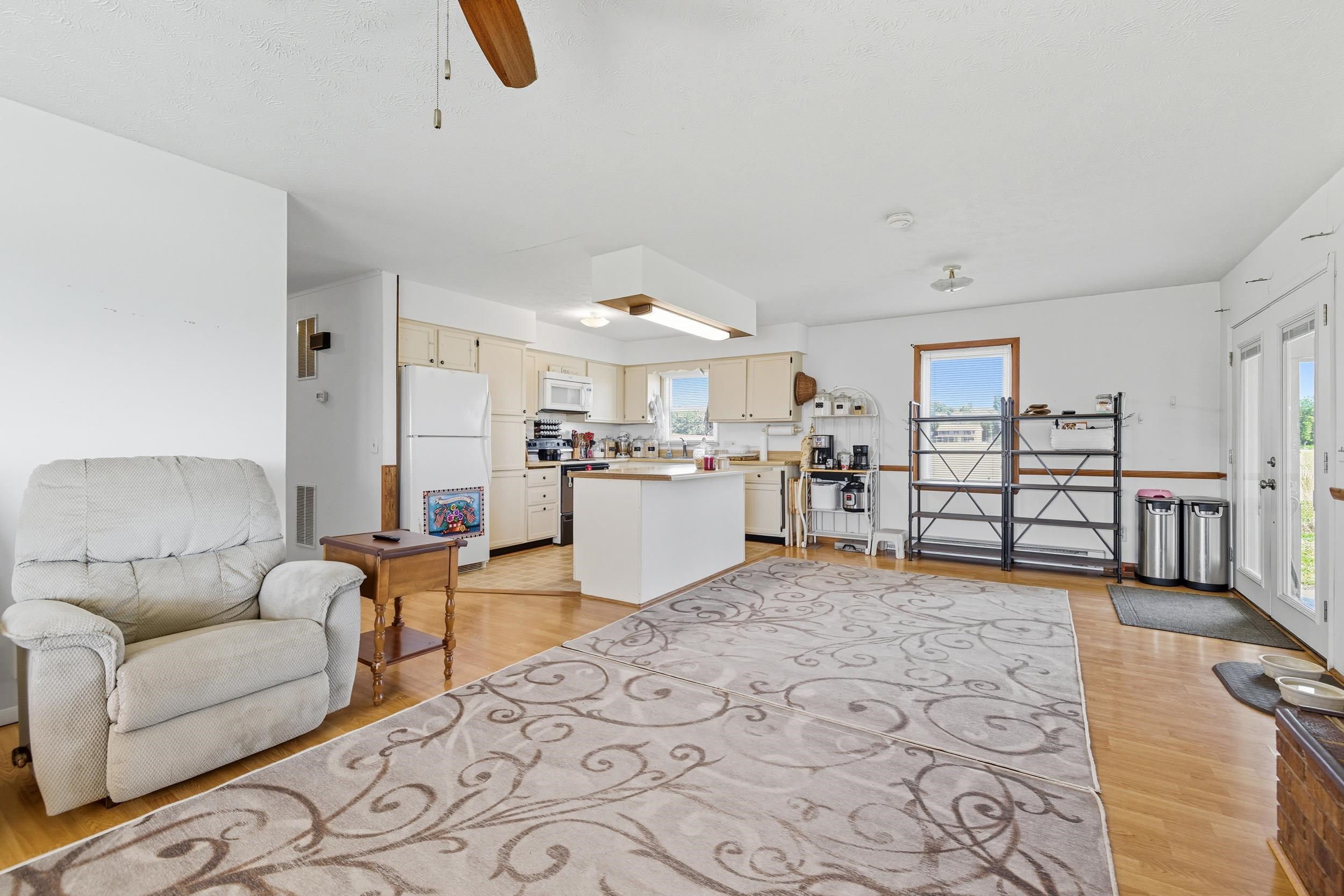 9108 Nazarene Church Road Bridgewater, VA 22812 - Photo 10 of 72 a living room with furniture and kitchen view