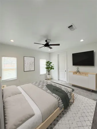 an empty room with windows and fan window