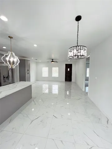 a view of a room with a chandelier