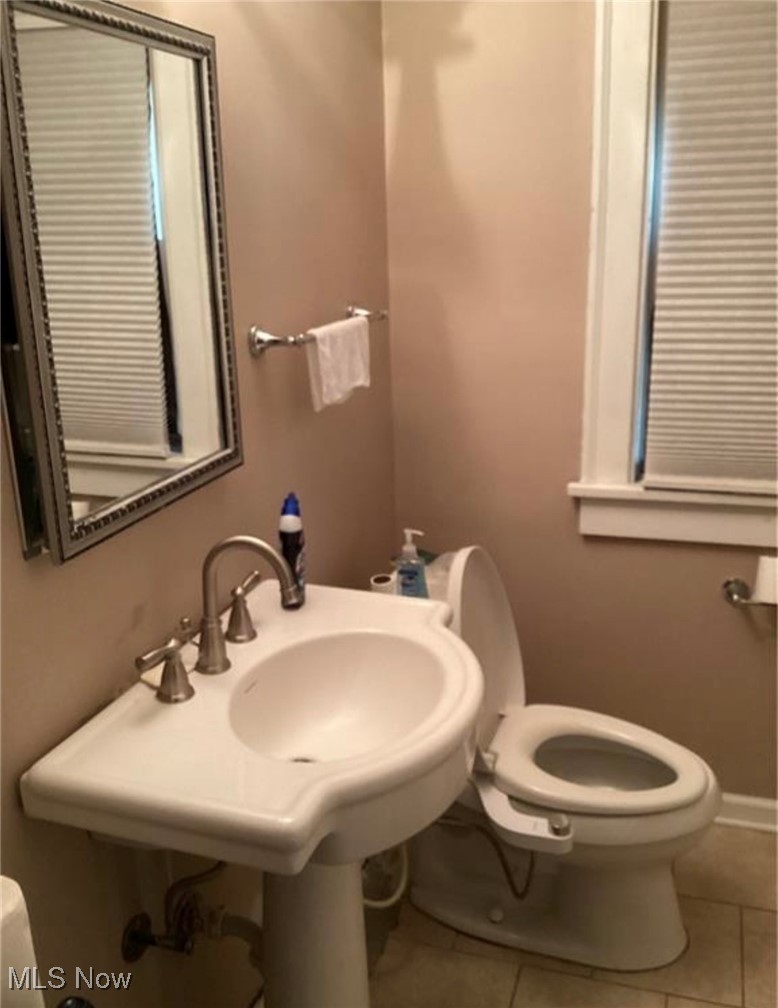 3362 Sutton Road Cleveland, OH 44120 - Photo 6 of 43 Half bathroom featuring tile patterned flooring and toilet