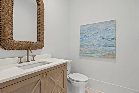 a bathroom with a sink a mirror and a shower
