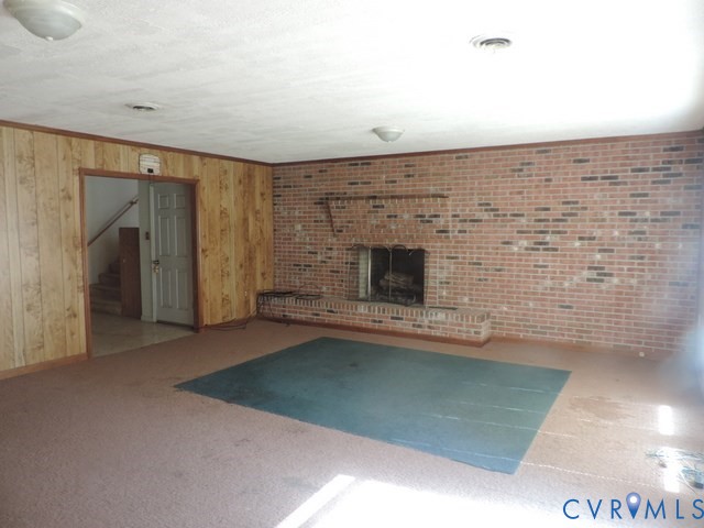 102 Hicks Lane Rice, VA 23966 - Photo 9 of 26 a view of empty room with a fireplace