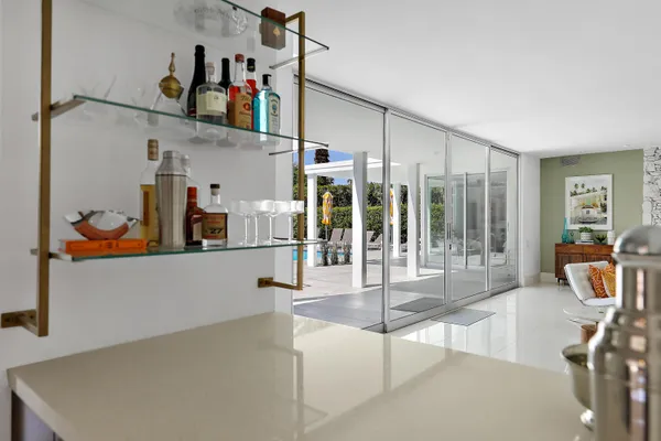 a view of a living room and bathroom