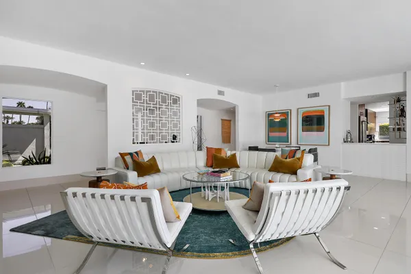 a living room with furniture and a couch