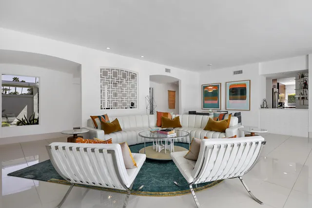 a living room with furniture and a couch