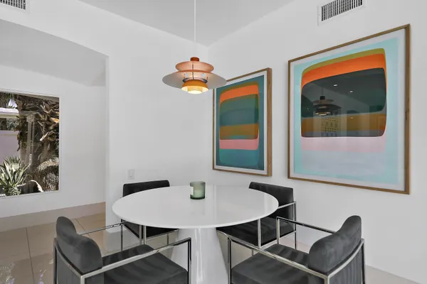 a view of a workspace with furniture