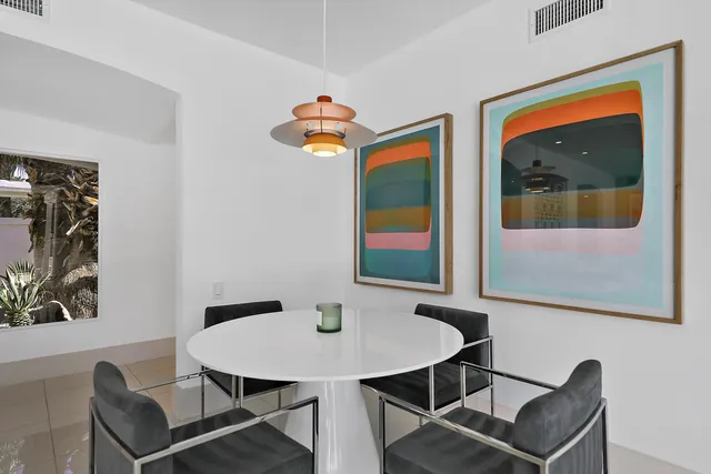 a view of a workspace with furniture