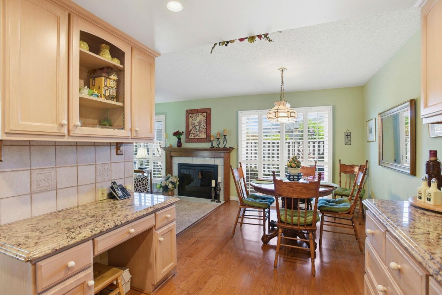 815 Rigel Lane Foster City, CA 94404 - Photo 14 of 48 a dining room with furniture a chandelier and wooden floor