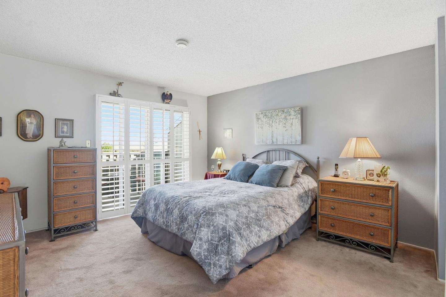815 Rigel Lane Foster City, CA 94404 - Photo 22 of 48 a bedroom with a bed and a walk in closet