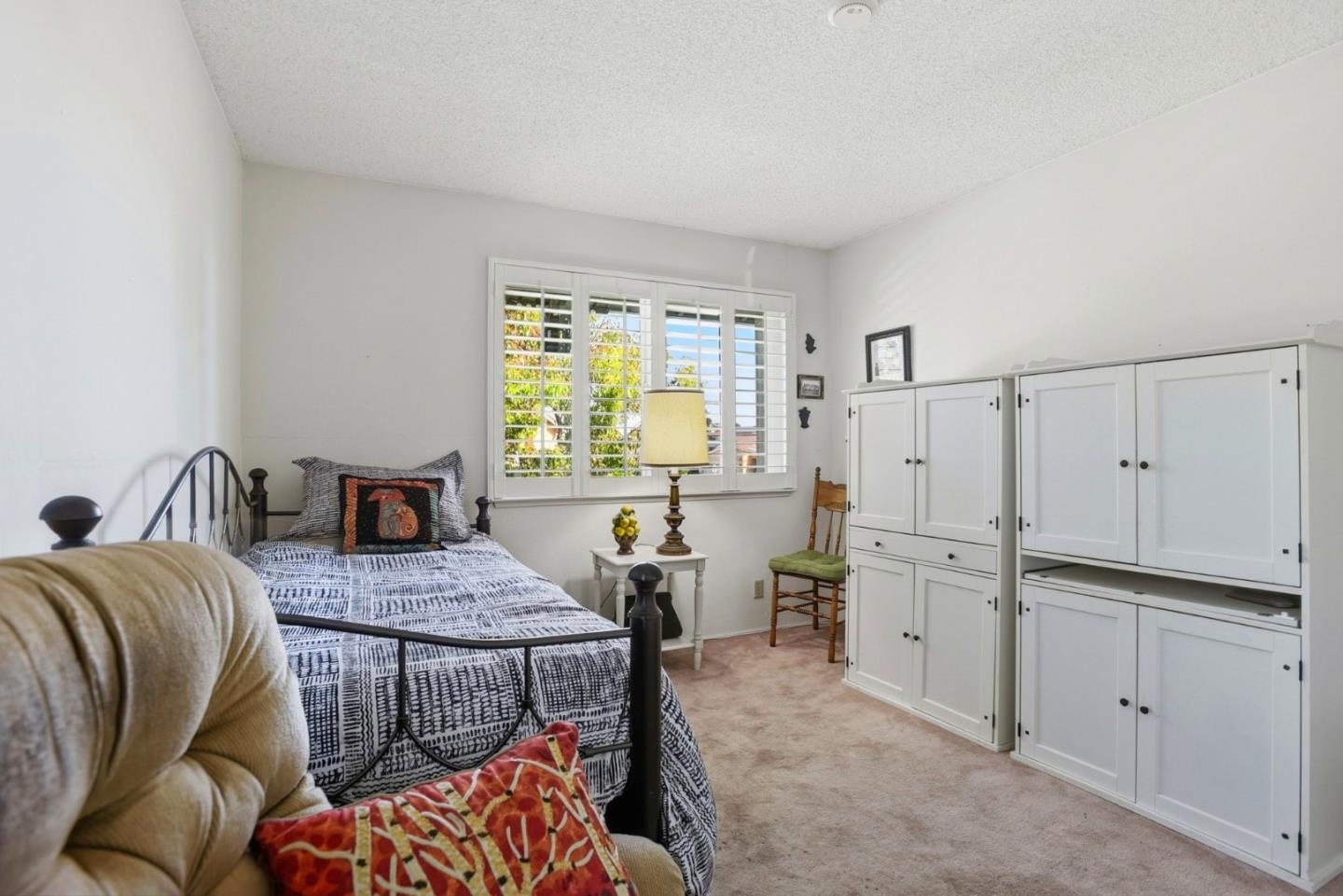 815 Rigel Lane Foster City, CA 94404 - Photo 27 of 48 a bed room with furniture and wooden floor