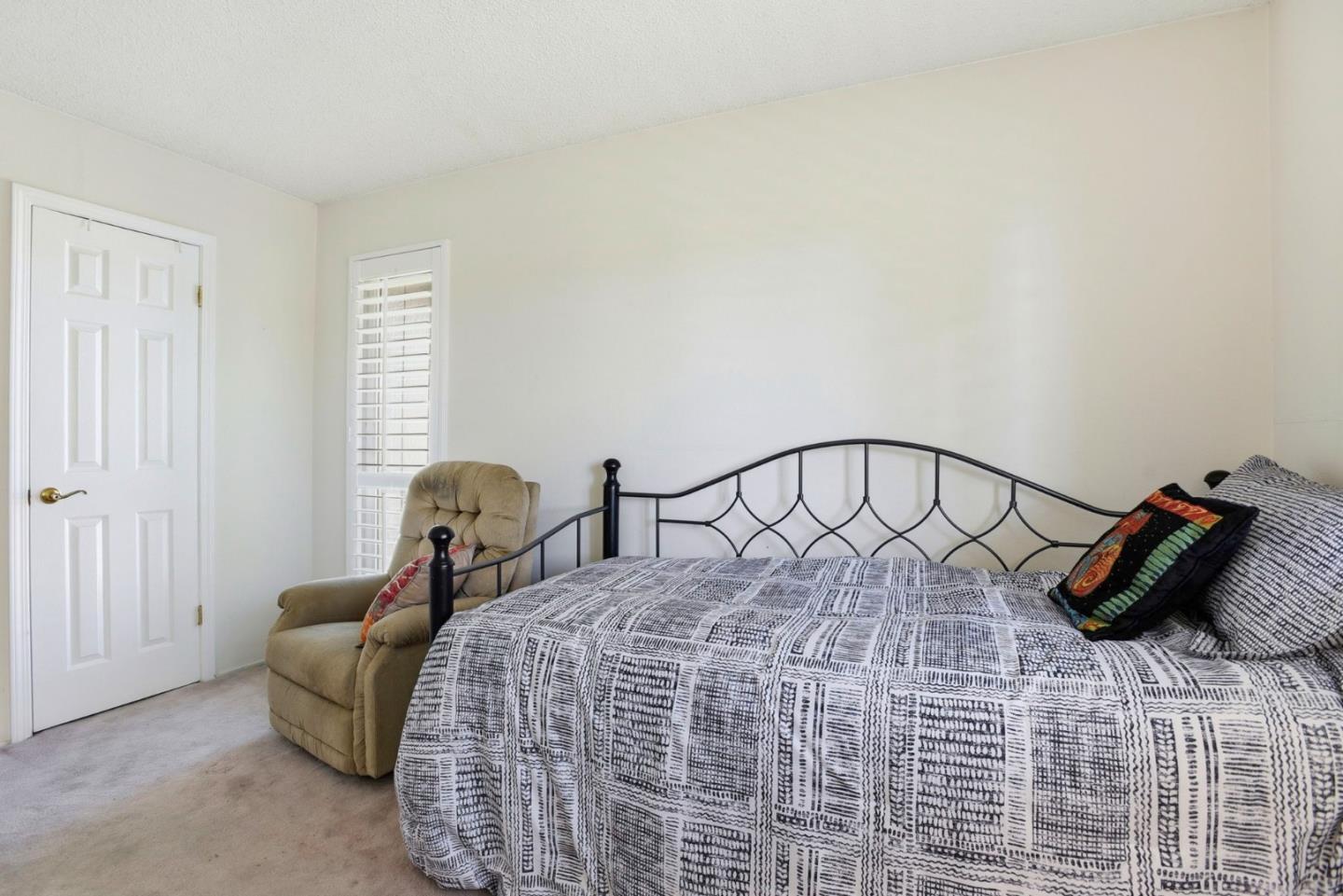 815 Rigel Lane Foster City, CA 94404 - Photo 28 of 48 a bed room with a bed and a couch