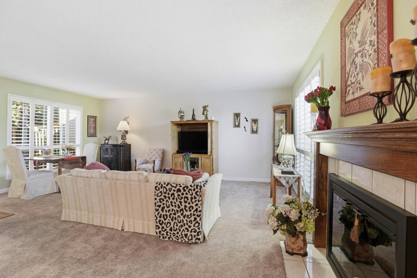 815 Rigel Lane Foster City, CA 94404 - Photo 9 of 48 a living room with furniture and a fireplace
